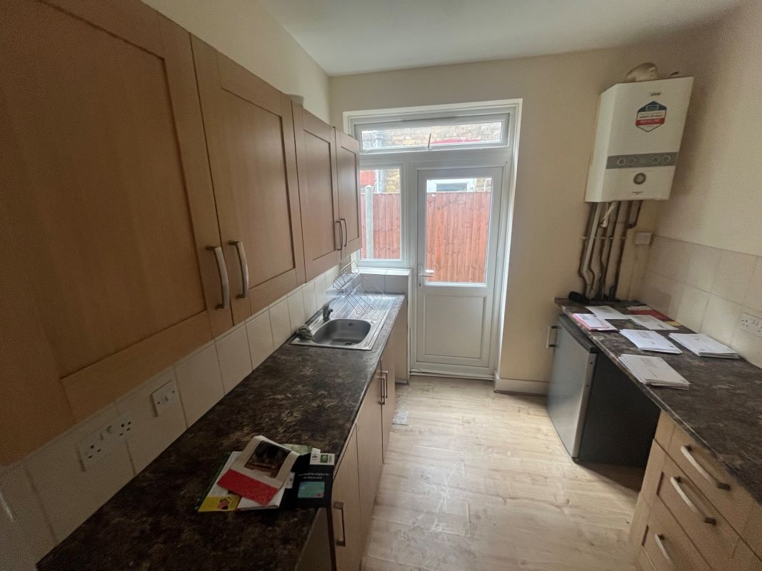 Leasehold Vacant Two Bedroom Flat with Front Yard and Shared Rear Garden