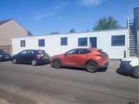 FREEHOLD COMMERCIAL WORKSHOP & YARD - PRODUCING £26,400 P.A.