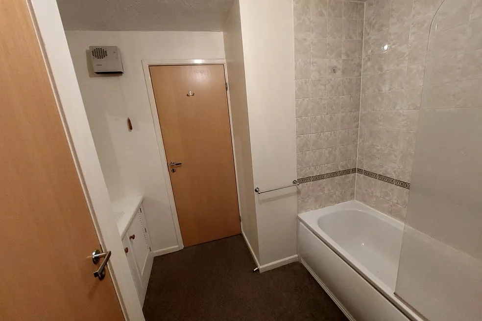 Vacant Long Leasehold Two Bedroom First Floor Flat with Parking Space