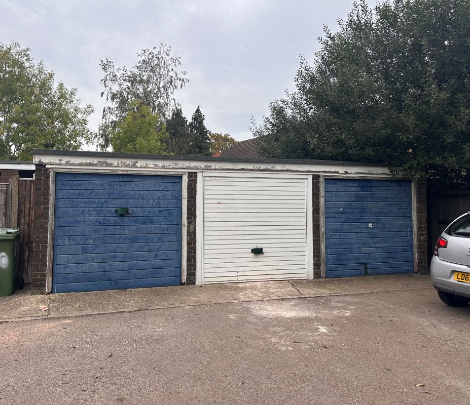 Garages and land at Giffard Drive, Farnborough, Hampshire, GU14 8QD -  Strettons