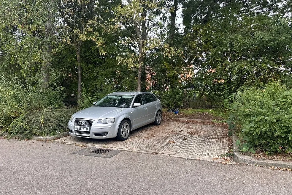 Freehold Site with 11 Garages and 11 Parking Spaces