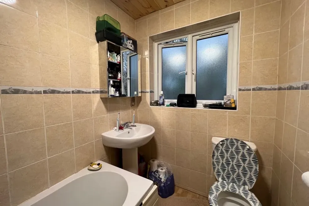 sold with 3 bedrooms through auction in 1 Saxon Avenue, Feltham