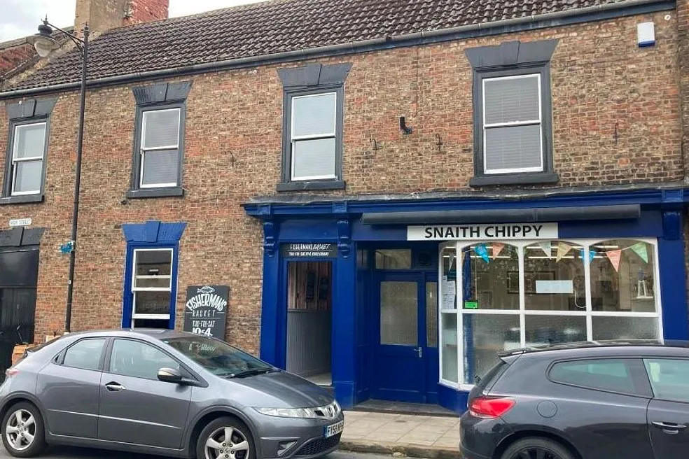 FREEHOLD SHOP & 2 BEDROOM FLAT PRODUCING £33,600 P.A.